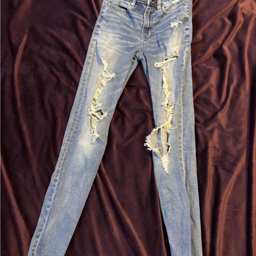 Distressed Blue Denim Jeans